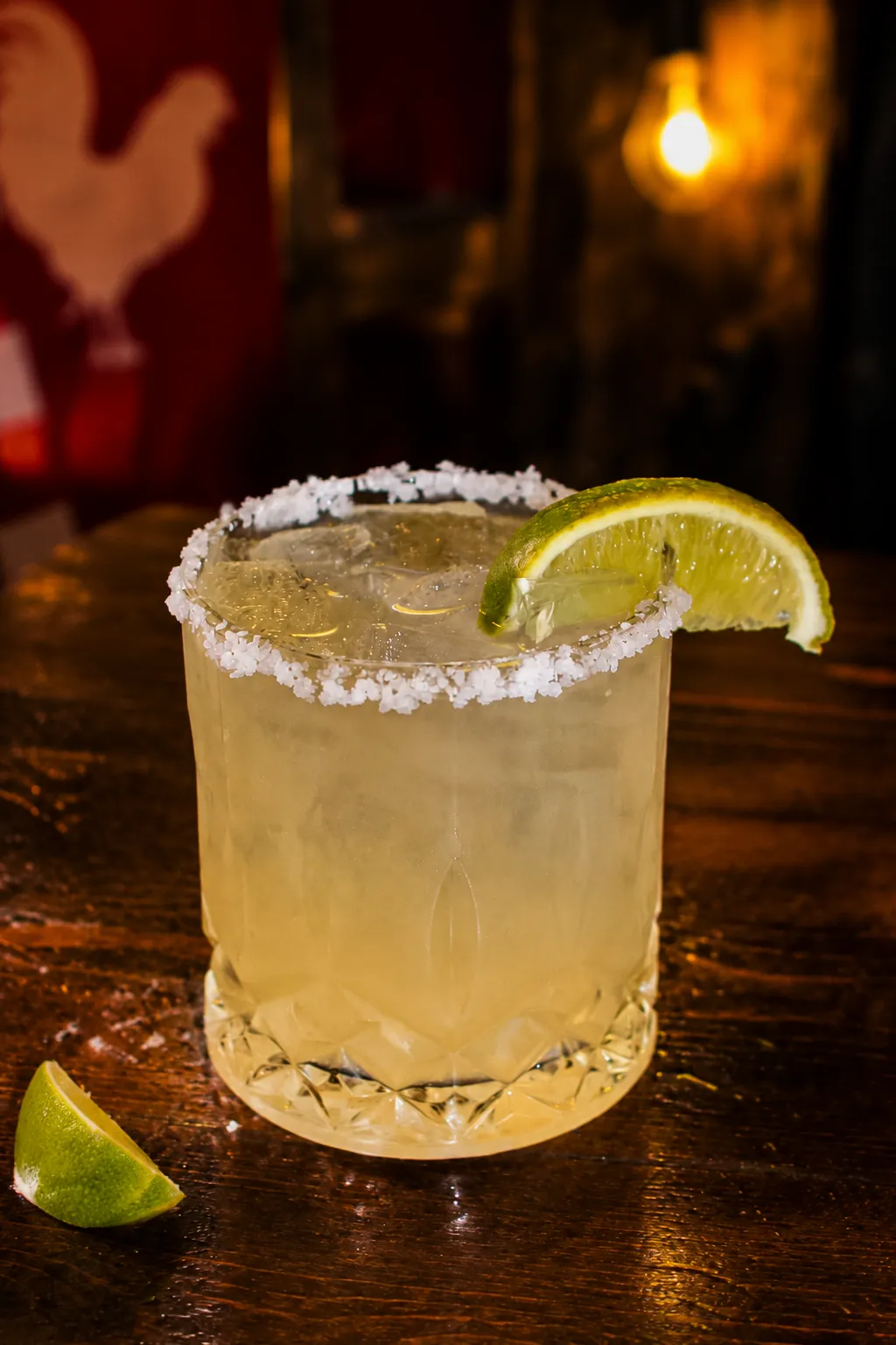 Classic Marg A refreshing classic margarita with a salt-rimmed glass, garnished with a lime wedge